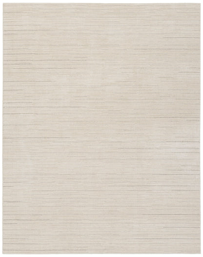 Beige flatweave rug with subtle horizontal stripe texture; neutral rectangular area rug.