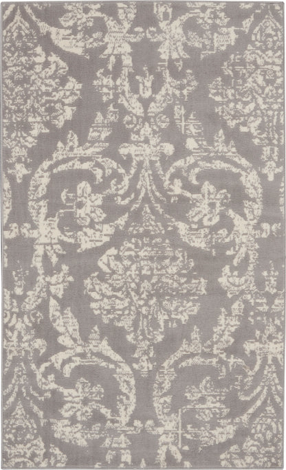 Grey area rug with ivory damask pattern and ornate floral motifs; rectangular, classic-modern style.