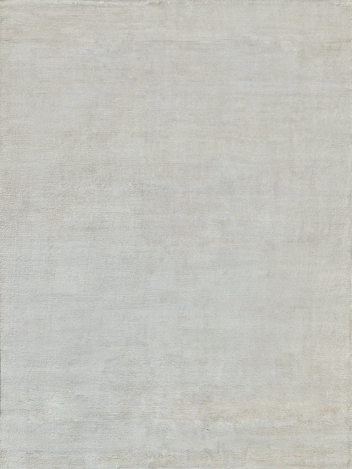 Light gray plush hand-knotted rug with a soft woven texture; indoor use, 2' x 3'.