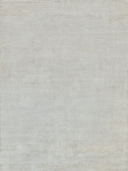 Light gray plush hand-knotted rug with a soft woven texture; indoor use, 2' x 3'.