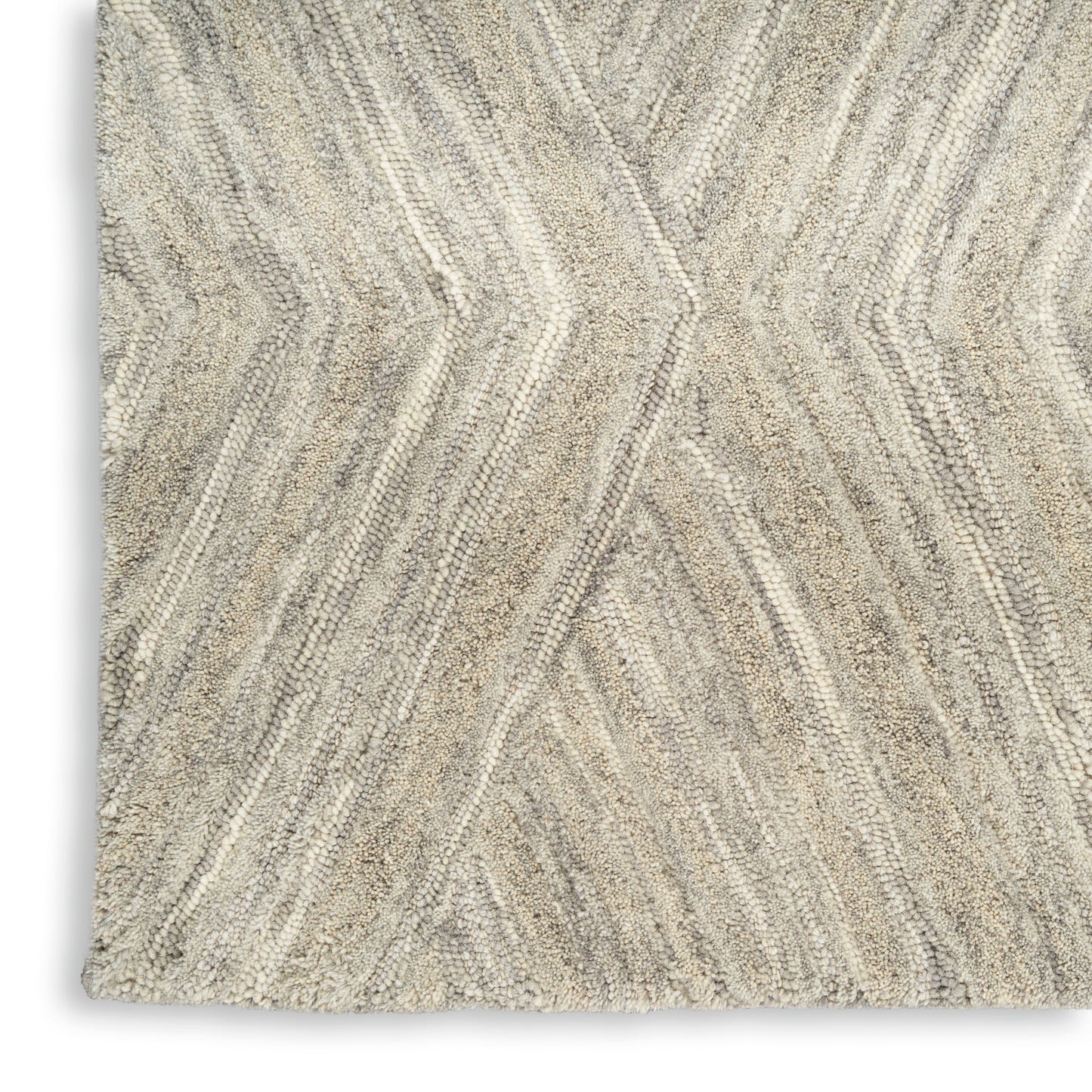 Beige textured area rug with cream chevron pattern and plush pile, rectangular for modern living room floors.