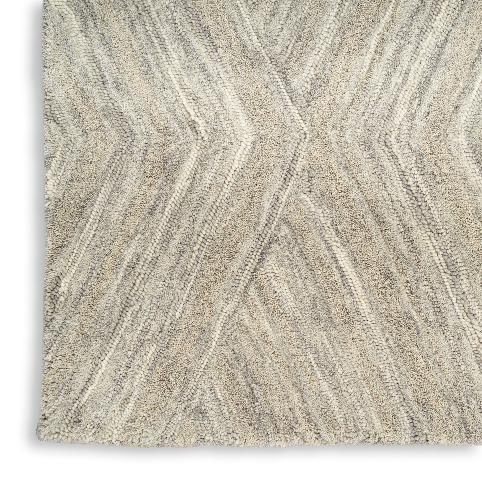 Beige textured area rug with cream chevron pattern and plush pile, rectangular for modern living room floors.