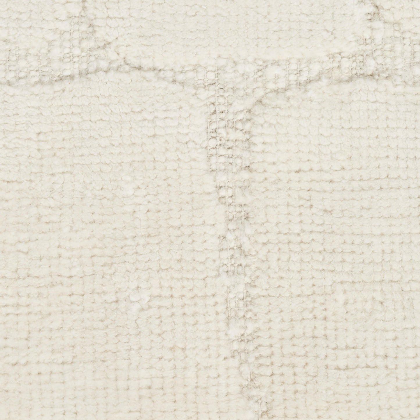 Cream textured boucle rug with a subtle grid pattern; plush, neutral decor for living room or bedroom.