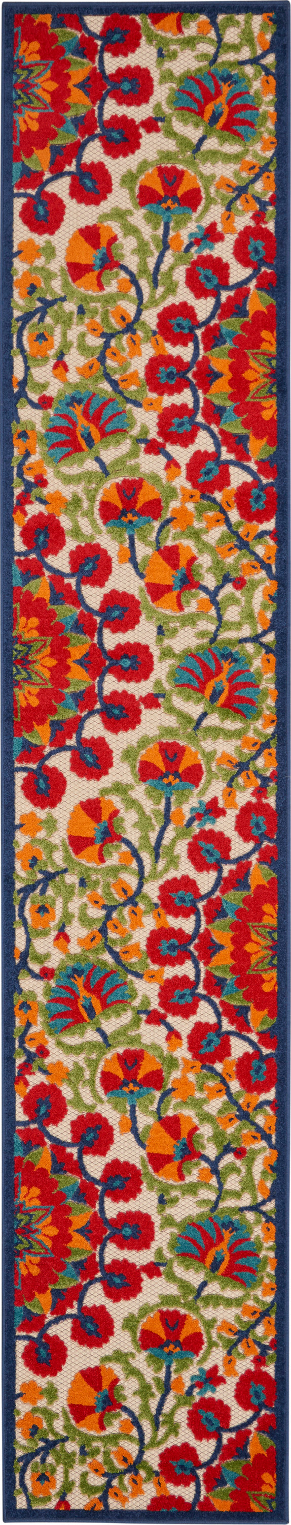 Vibrant floral patterned rug runner with red, orange, blue and green blooms on cream, framed by a navy border.