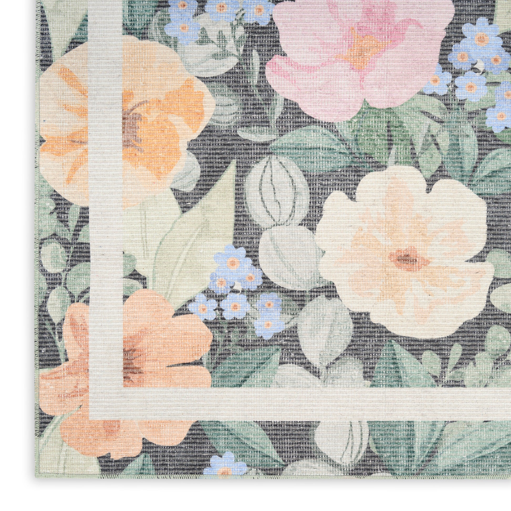 Pastel floral fabric with peach and pink blooms, small blue flowers, green leaves, linen texture and a white corner border