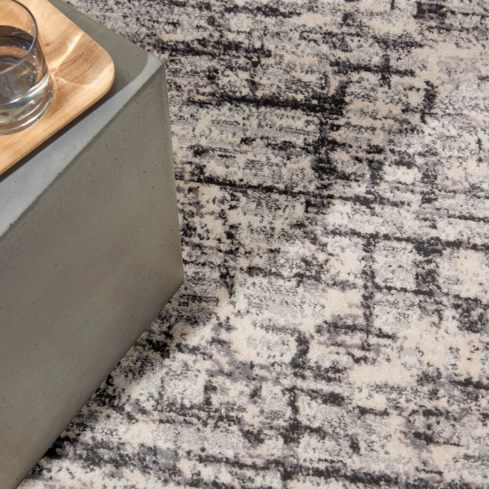 Gray textured patterned rug.