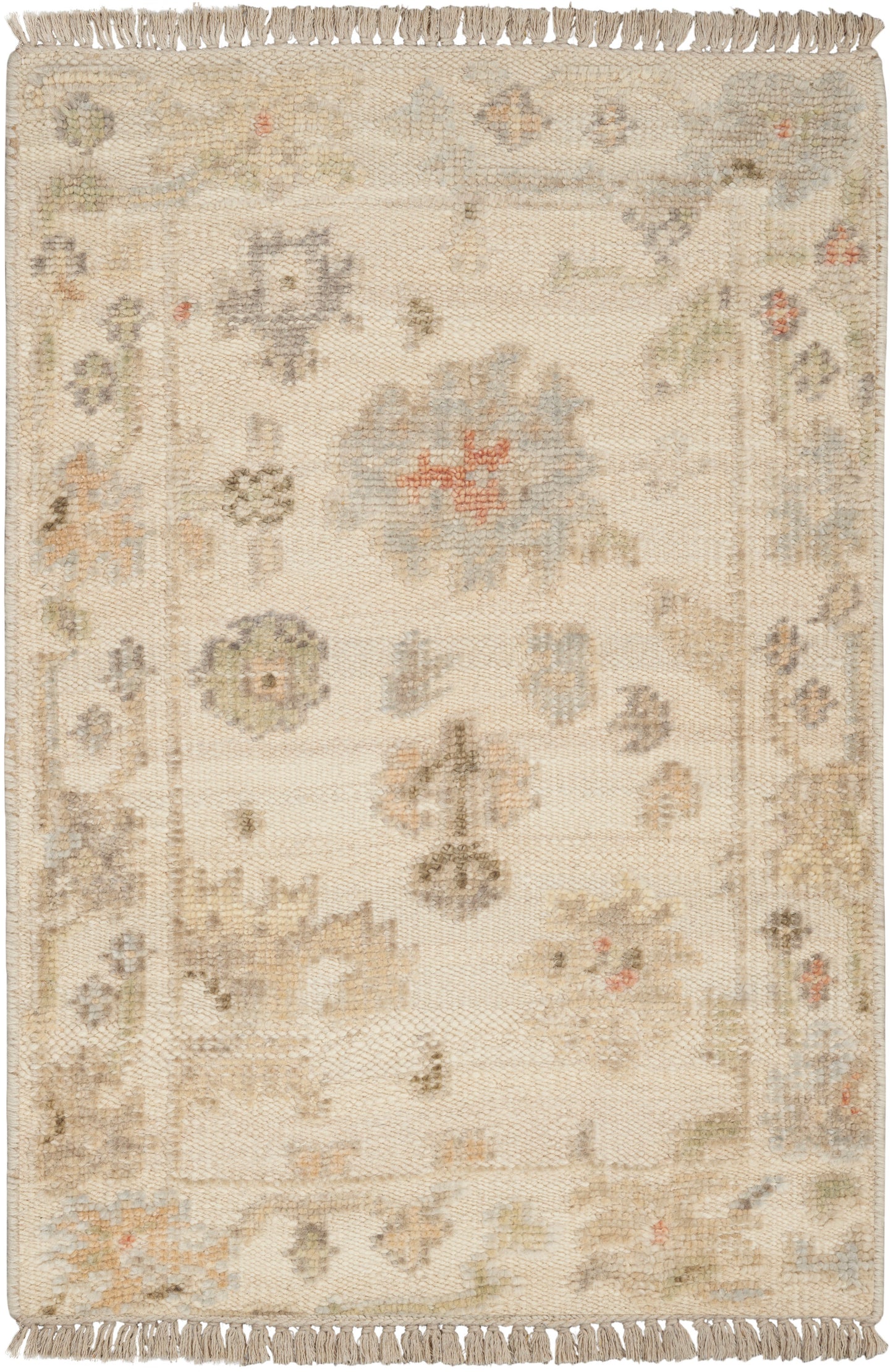 Cream-toned woven rug with subtle pastel floral motifs, light border and fringed ends.