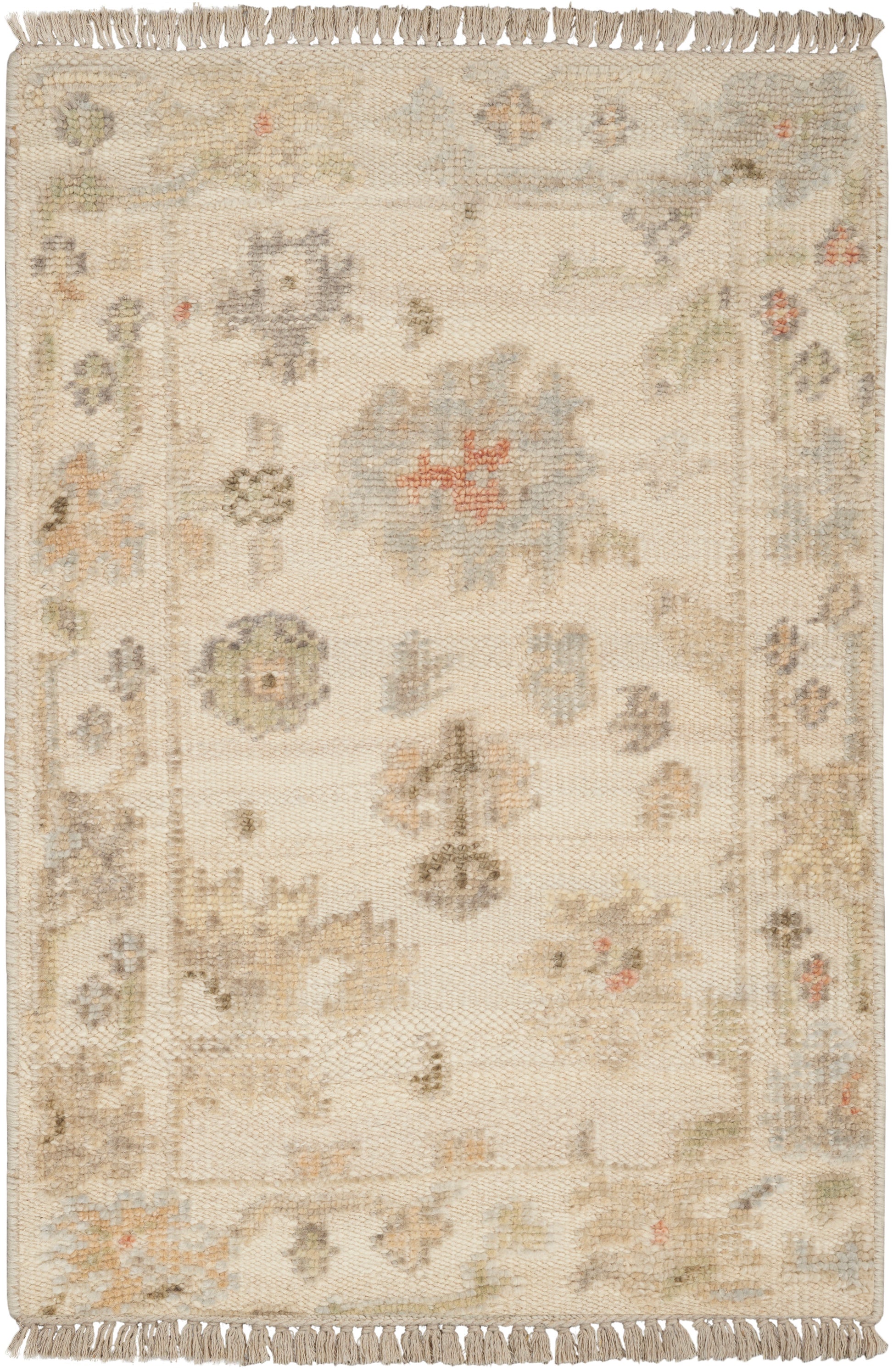 Cream-toned woven rug with subtle pastel floral motifs, light border and fringed ends.