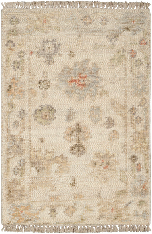 Cream-toned woven rug with subtle pastel floral motifs, light border and fringed ends.