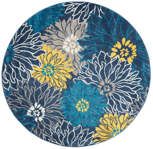 Round floral rug with blue, teal and yellow chrysanthemum motifs, white outlines on navy and gray background