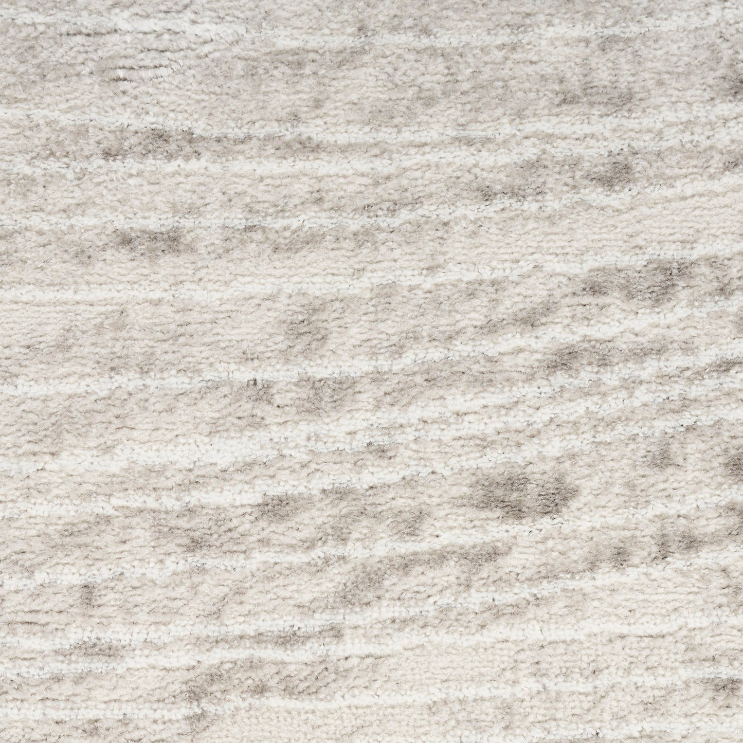 Cream beige shag rug with soft plush pile and subtle variegated pattern for living rooms