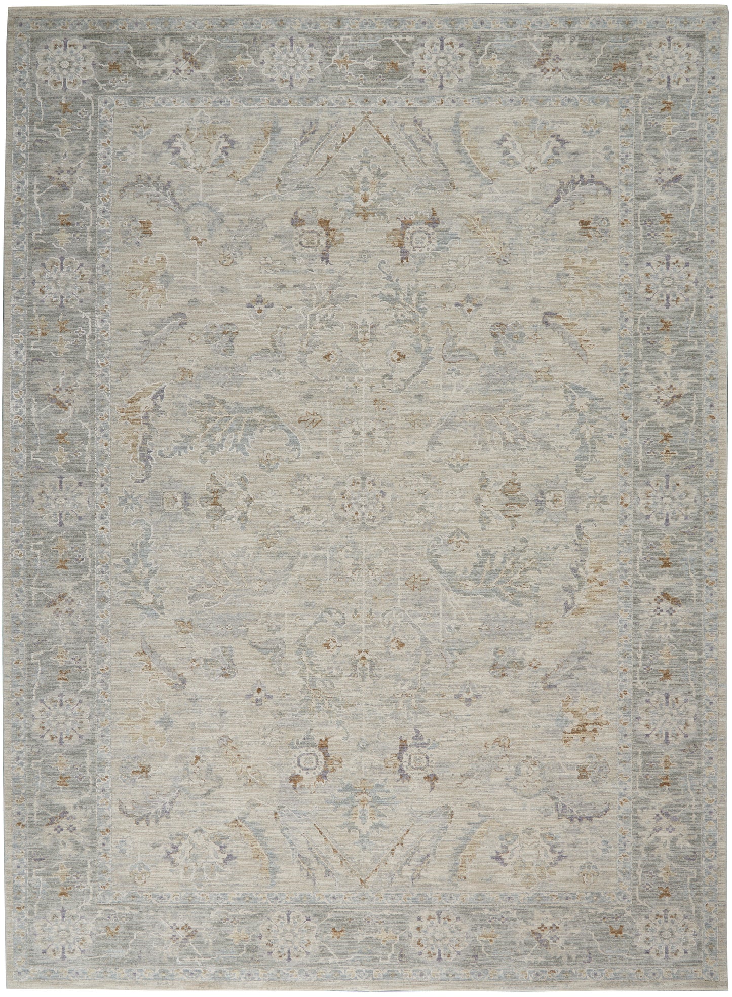 Distressed light-gray oriental rug with pale blue and beige florals and ornate border.