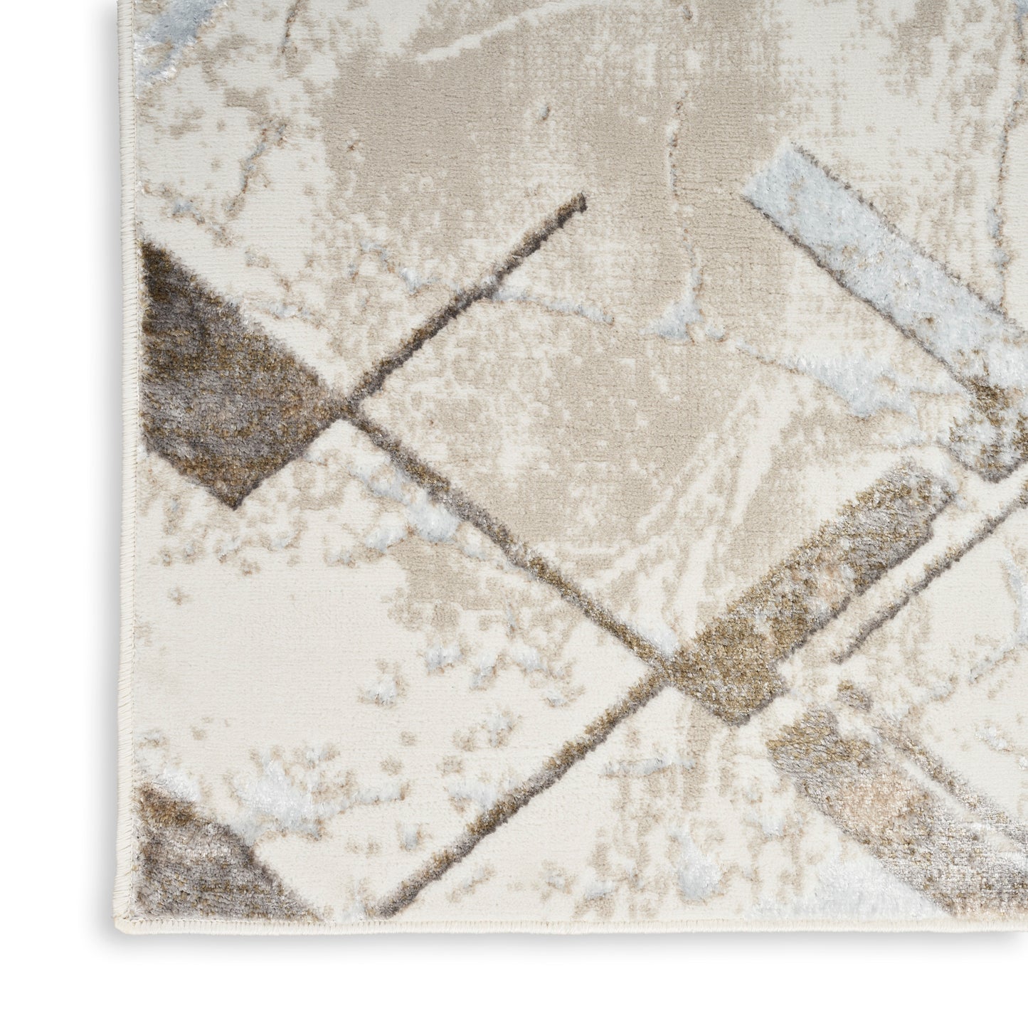 Beige cream rug with an abstract geometric pattern of intersecting brown and gray lines.