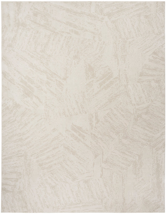 Cream textured rectangular rug with subtle beige brush stroke pattern for a soft, modern look.