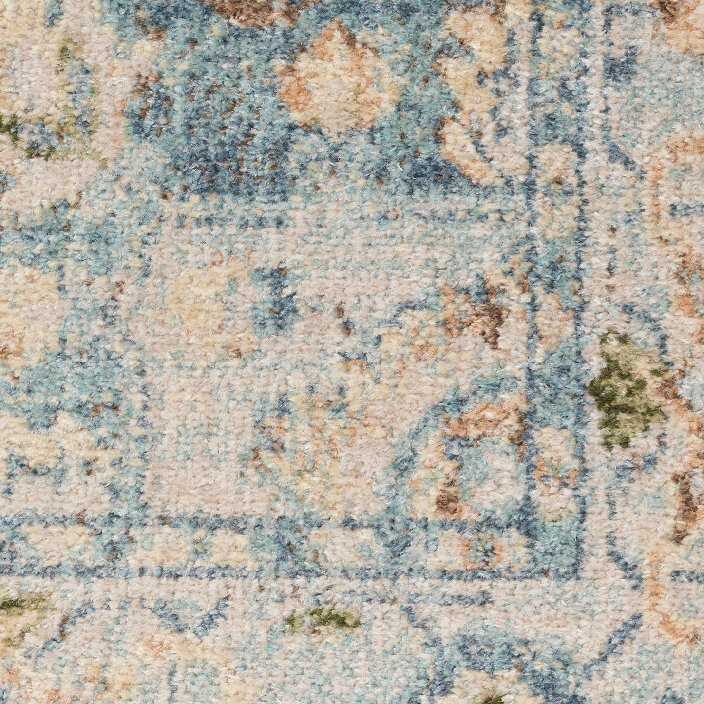 Soft blue and beige Persian-style rug with floral medallions and distressed finish for cozy living spaces.