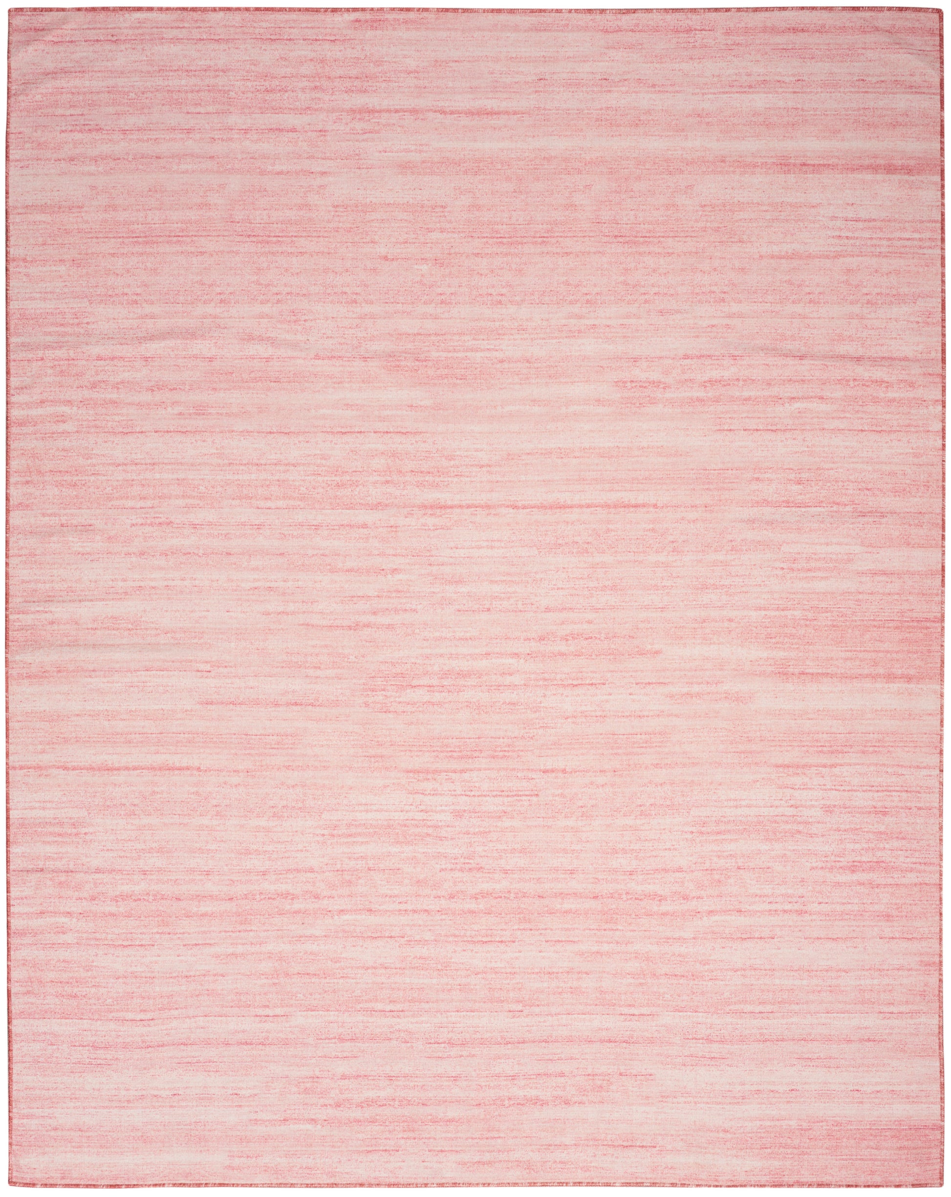 Soft pink rectangular rug with a subtle gradient and light texture, flat-weave style.