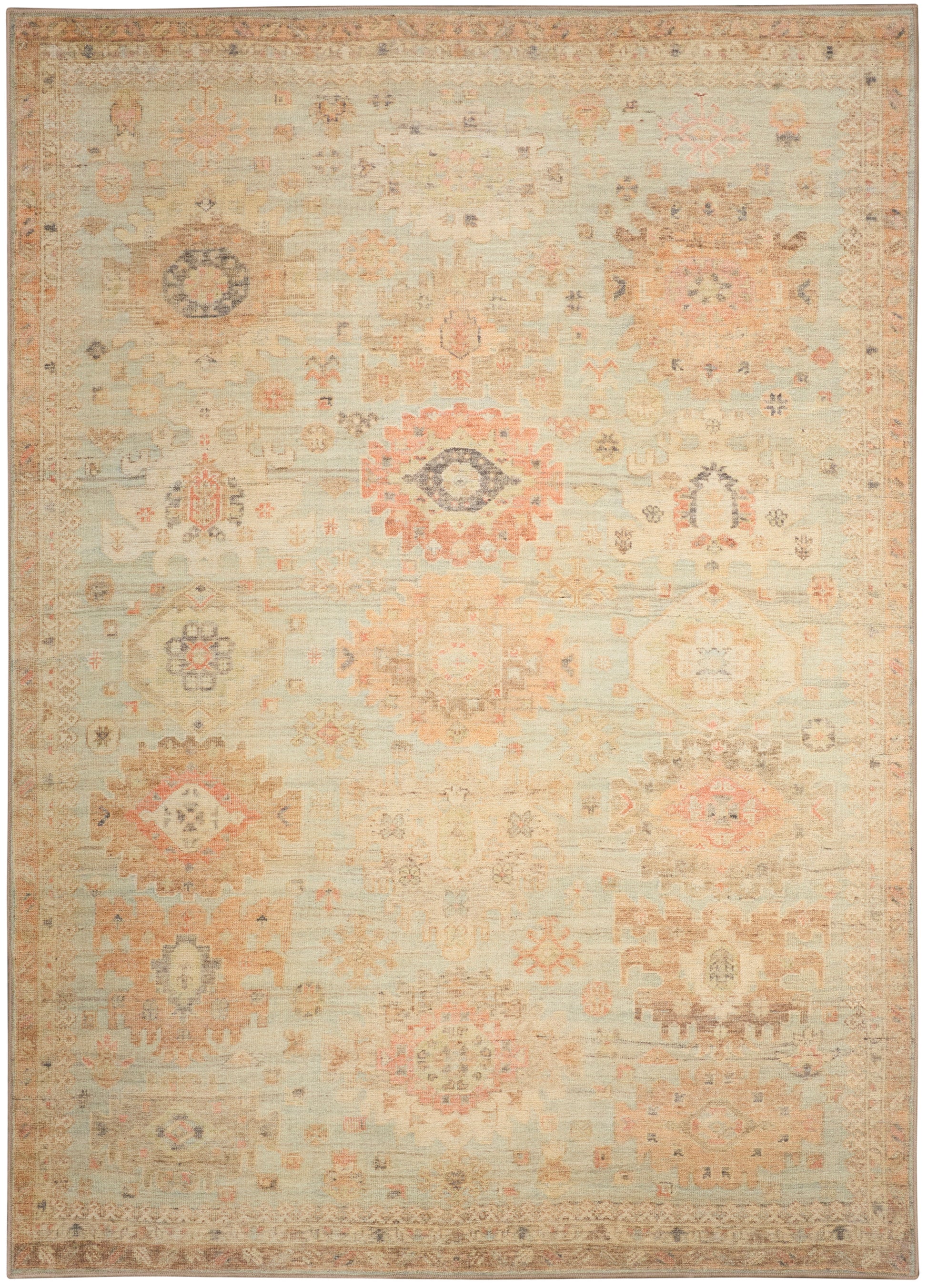 Rectangular traditional oriental-style rug in beige with faded pink, peach and light blue geometric medallion motifs.