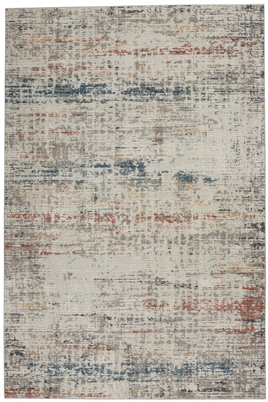 Rectangular abstract distressed area rug in cream with blue, rust, gray & tan accents; modern, woven texture.