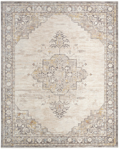 Cream-beige oriental rug (8' x 10') with central medallion, stepped corners, muted gray-gold border, distressed vintage look.
