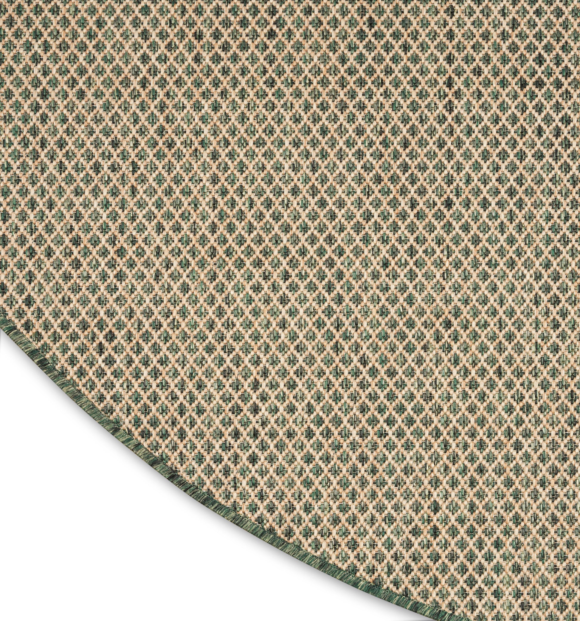 Teal and beige diamond lattice textile with a green border along a curved edge.