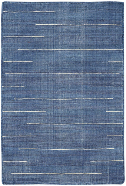 Blue denim-style rug with irregular white stitch lines, rectangular, casual modern decor.