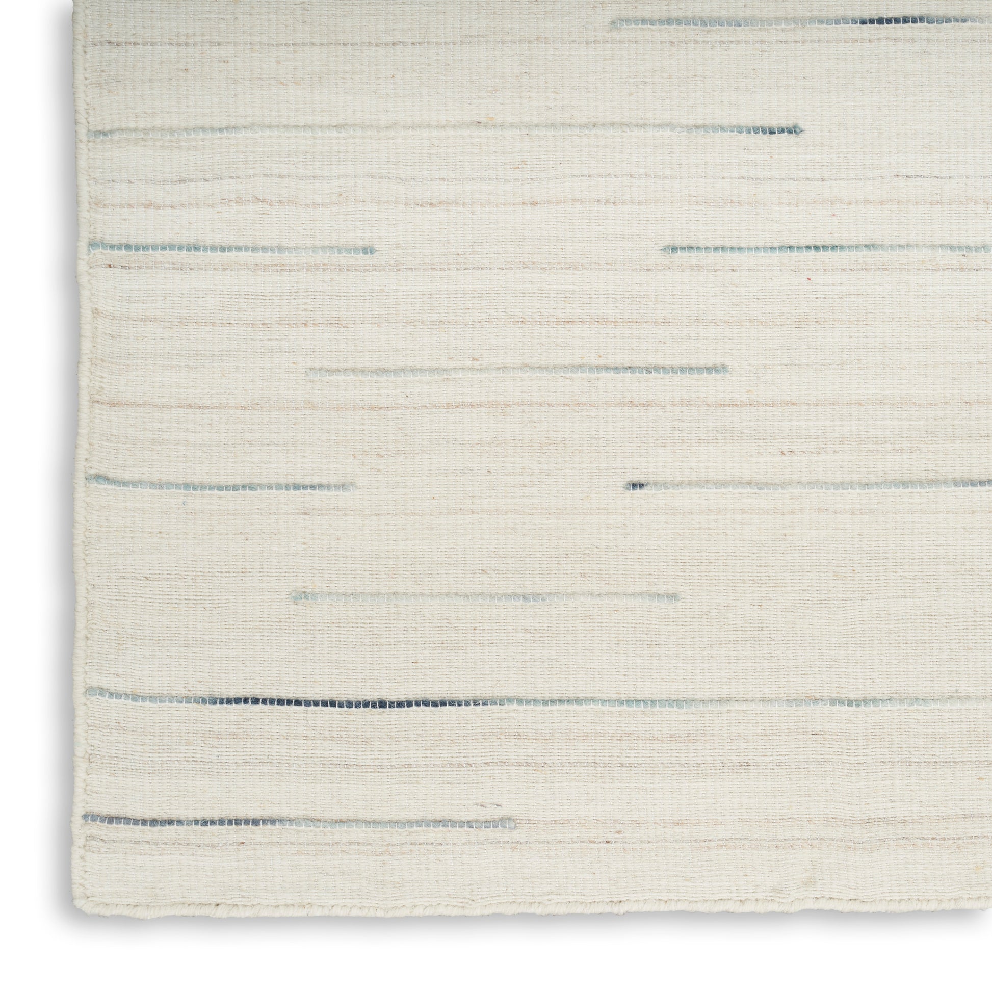 Ivory woven rug with subtle blue-gray horizontal lines; soft textured, modern minimalist style.