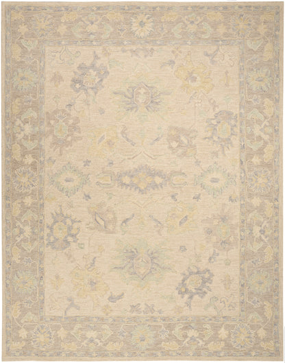 Cream field area rug with pastel blue, yellow and green floral border; muted, vintage-inspired oriental look.