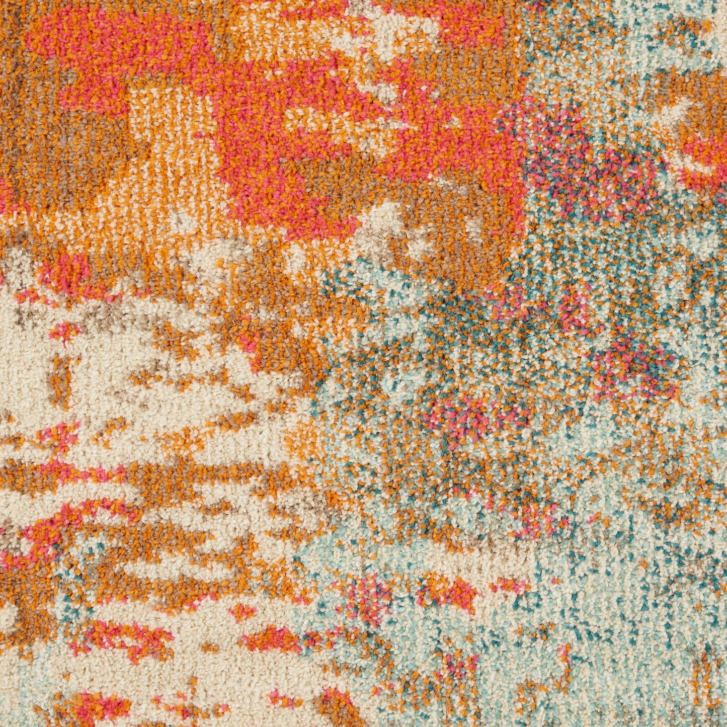 Plush shag area rug with abstract multicolor pattern in pink, orange, cream & teal.