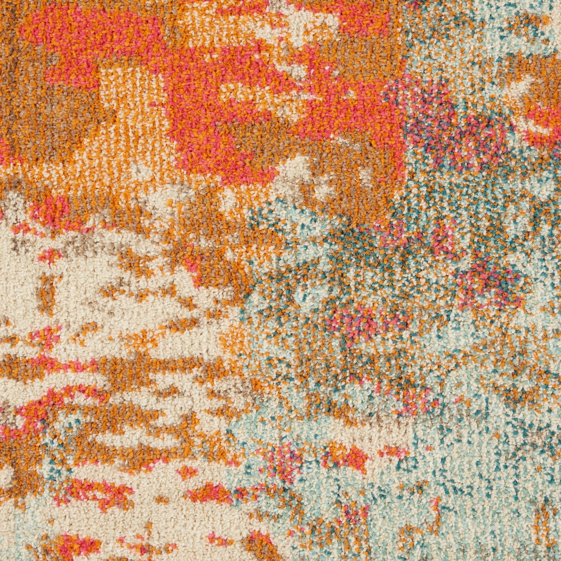 Plush shag area rug with abstract multicolor pattern in pink, orange, cream & teal.
