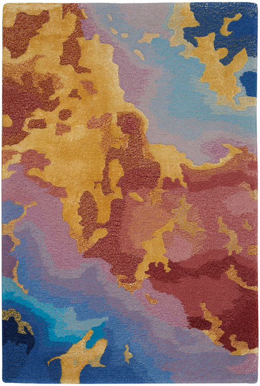 Rectangular abstract area rug with vibrant orange, yellow, red, blue and purple blotches; textured modern design.