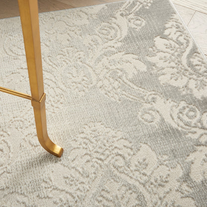 Light gray damask-pattern rug