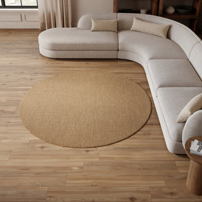 Light beige round rug (8' round) in a cozy modern living room.