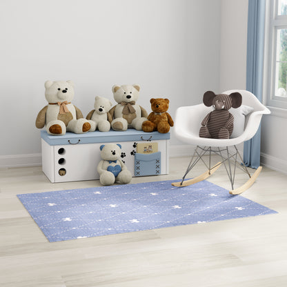 Nursery scene with teddy bears on a white and blue bench, blue rug, and a white rocking chair with a striped elephant plush.
