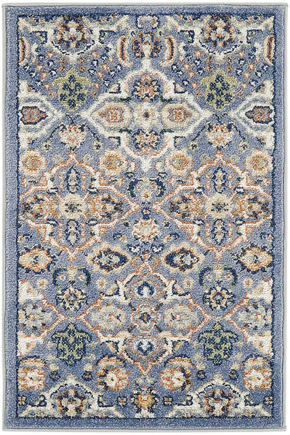 Rectangular blue Oriental area rug with ivory, peach, & green floral medallion pattern.