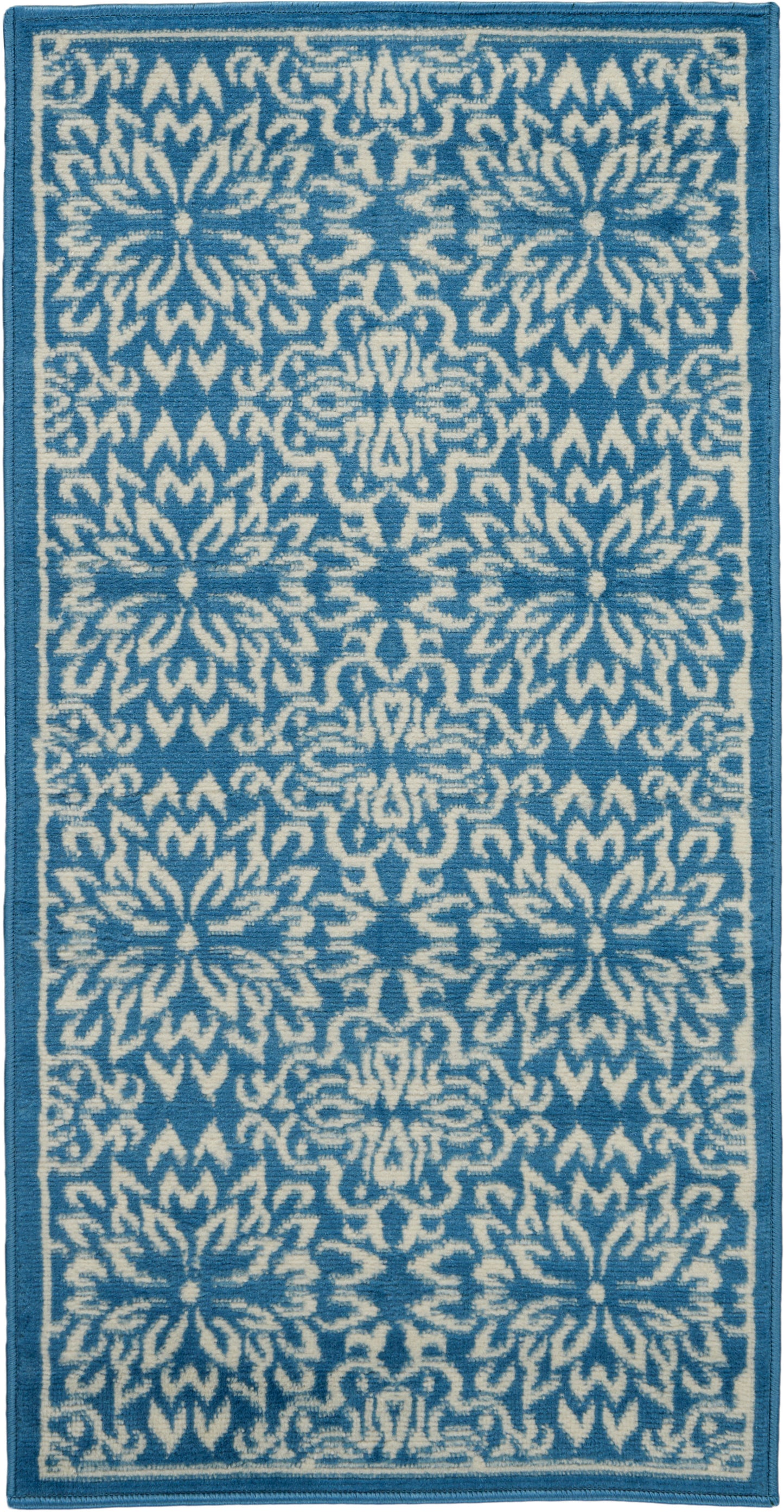 Rectangular blue & white woven runner rug with repeating floral-geometric motif & dark blue border.