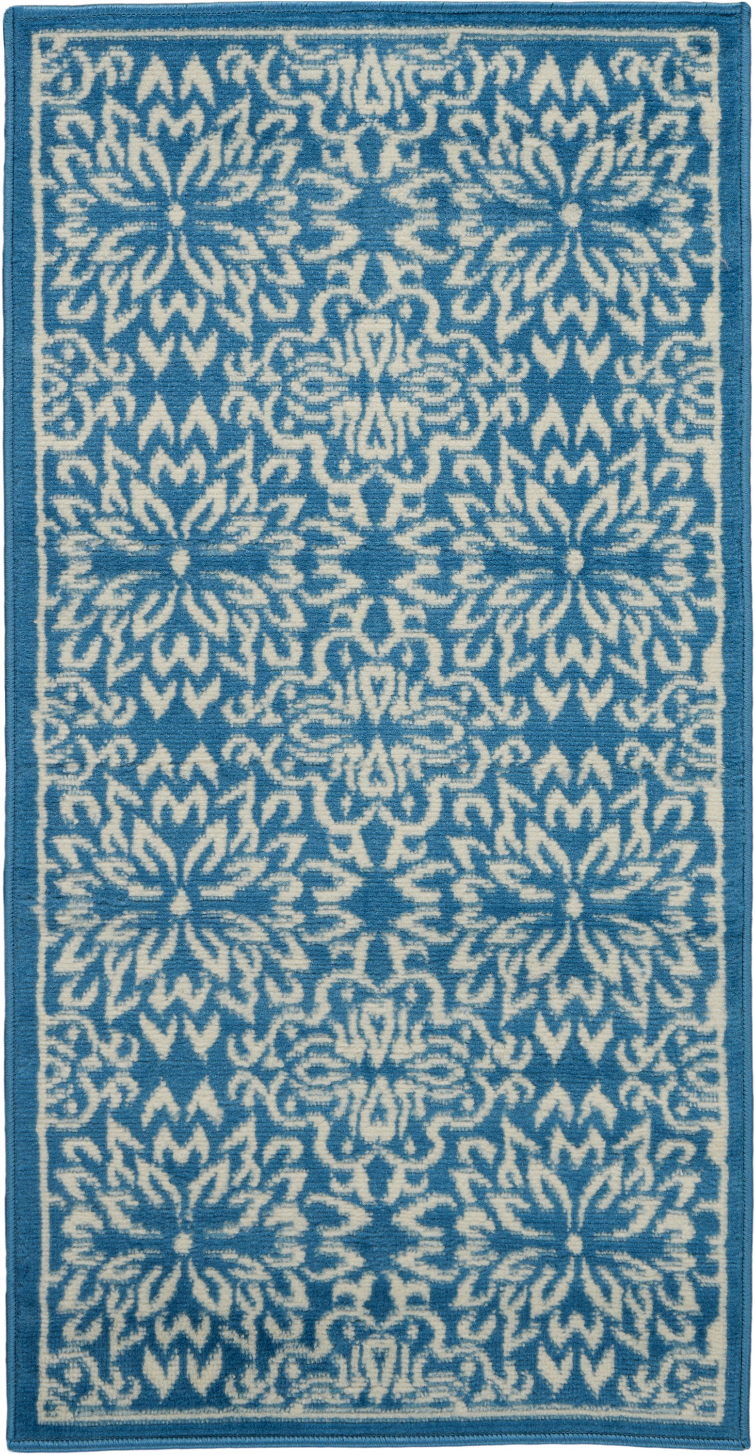 Rectangular blue & white woven runner rug with repeating floral-geometric motif & dark blue border.