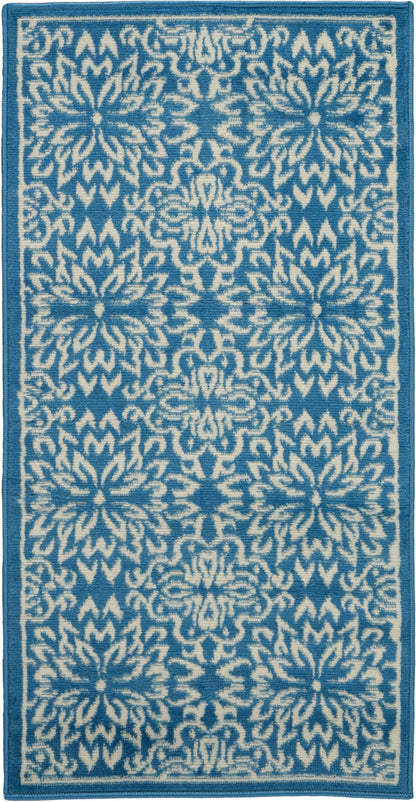 Rectangular blue & white woven runner rug with repeating floral-geometric motif & dark blue border.