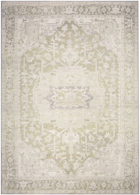Rectangular distressed oriental rug in ivory and pale gray with a central medallion and ornate border.