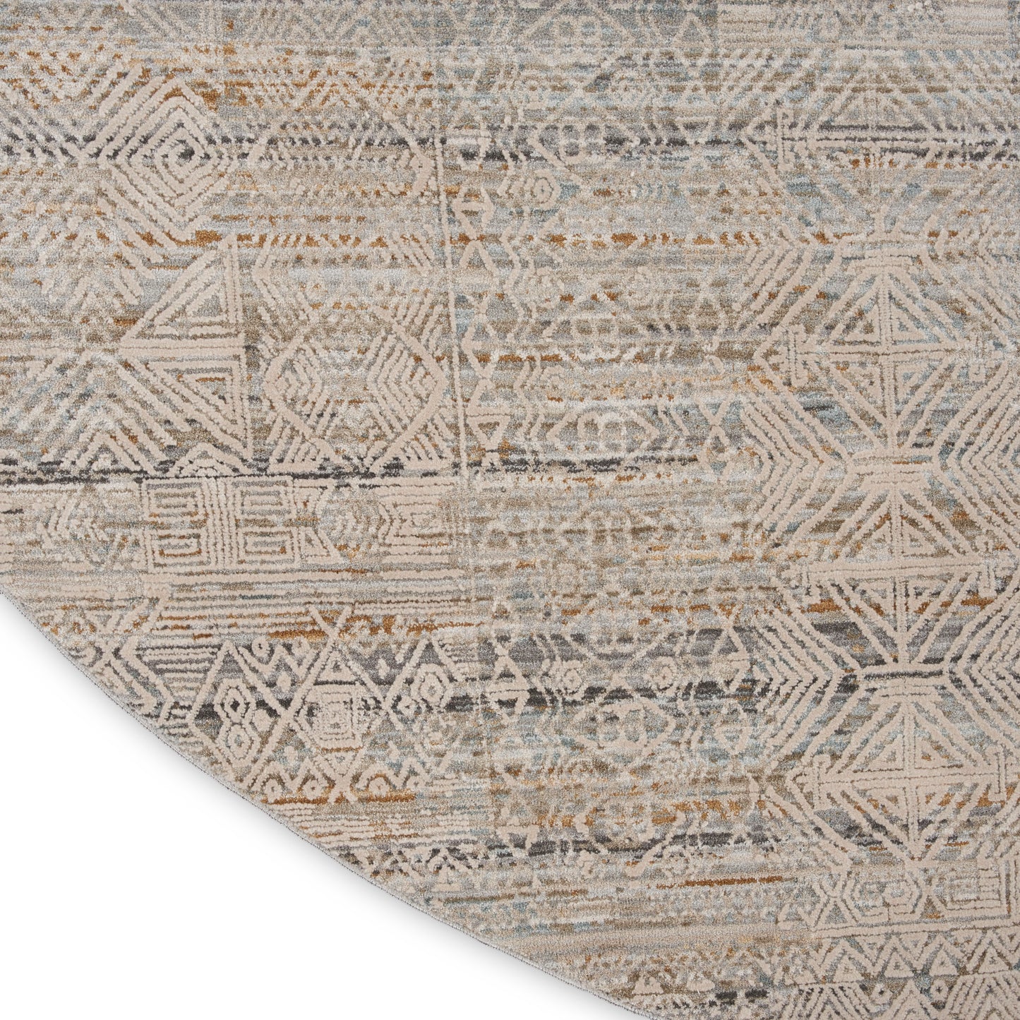 Round distressed area rug with geometric tribal pattern in beige, taupe, and blue-gray.