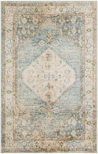 Distressed vintage-style area rug with light blue field, white diamond medallion, and ornate beige floral border.