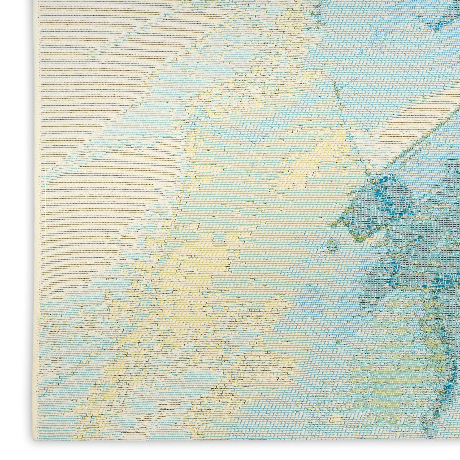 Coastal map rug in pale blues and sandy yellows with coastline outlines; 5' x 7' rug.