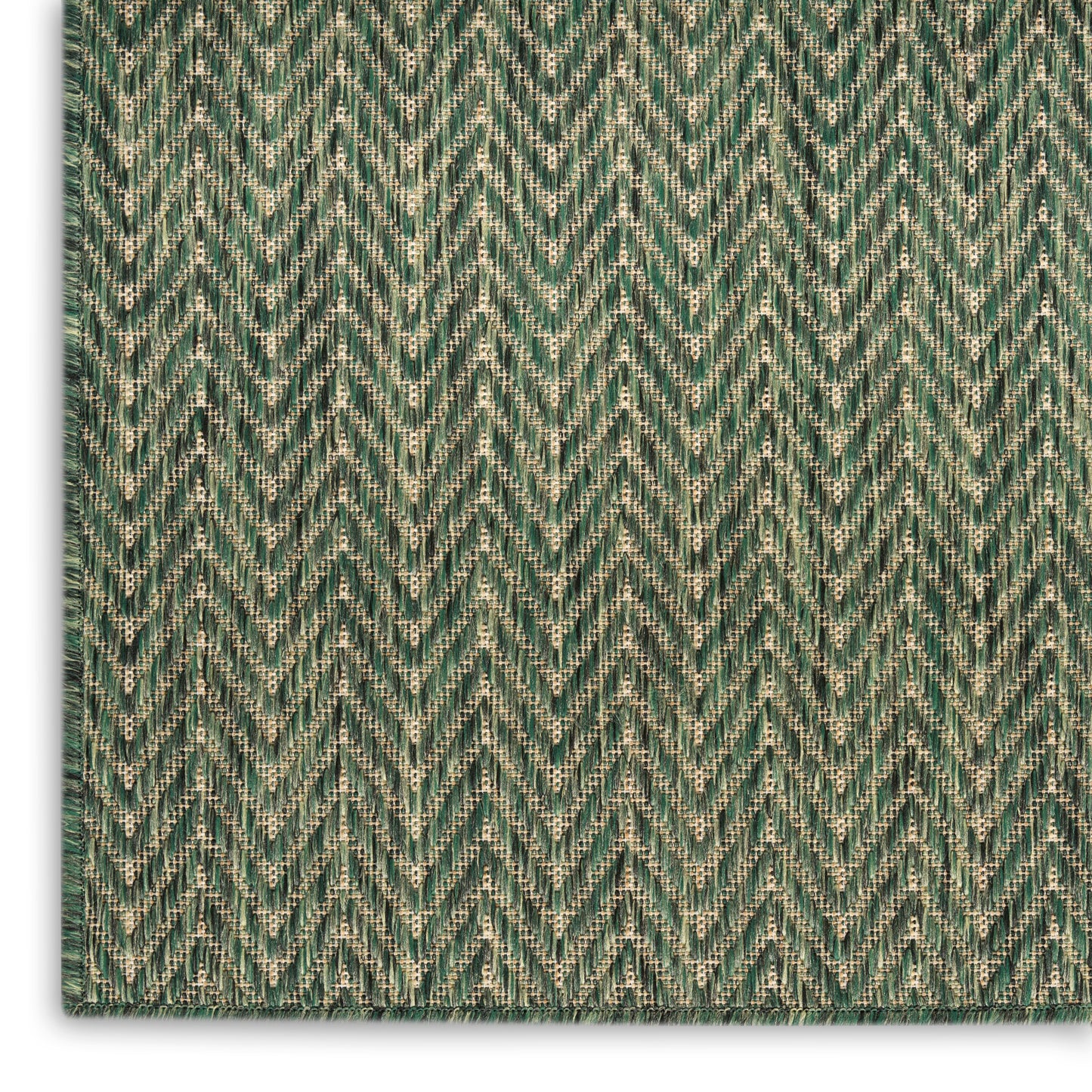 Green chevron-patterned woven fabric with subtle herringbone texture; upholstery or rug material.
