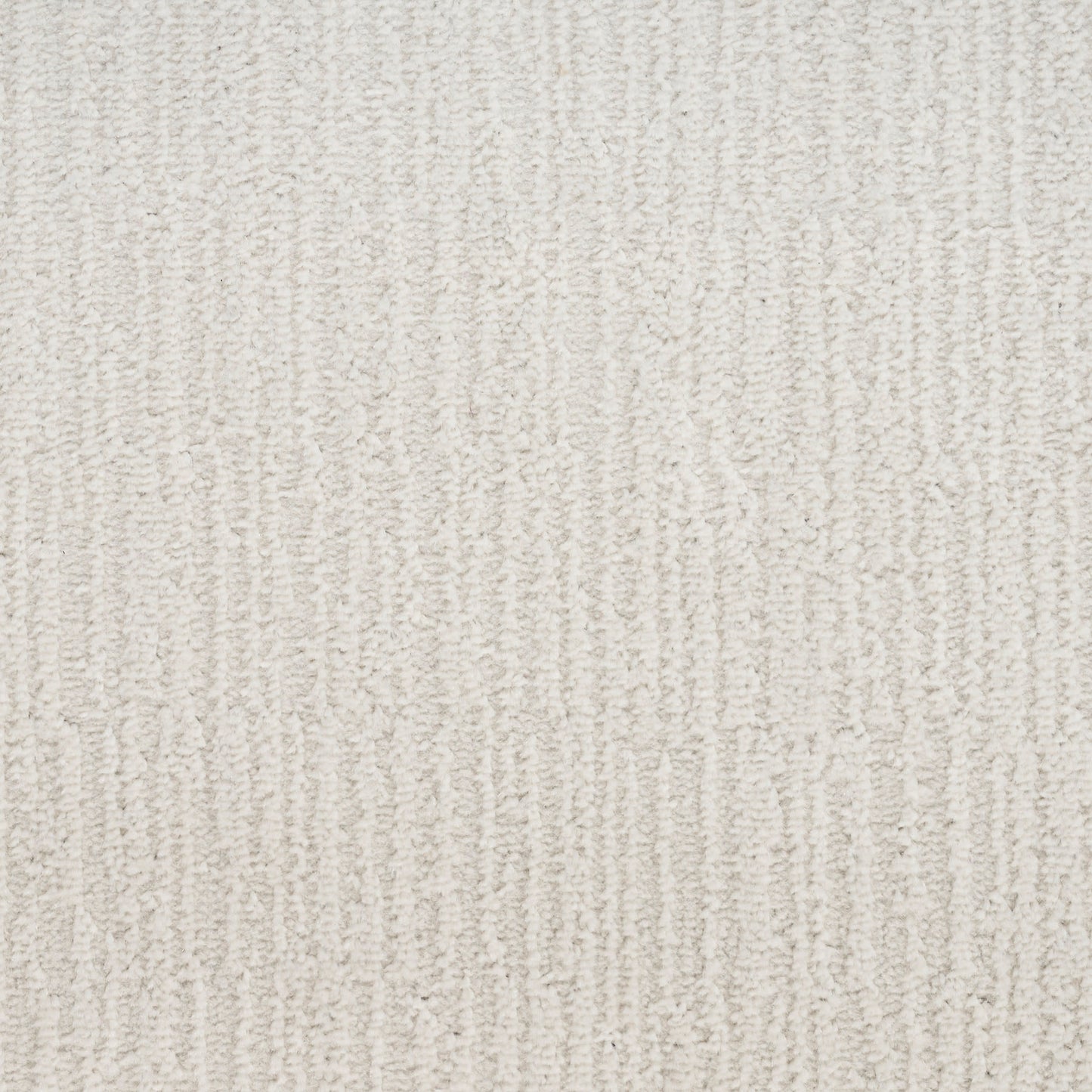 Cream-beige textured carpet with vertical loop pile pattern and soft plush feel.
