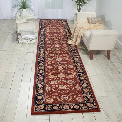 Persian-style runner rug with deep red field, gold floral motifs, and navy border; beige trim, narrow long runner.