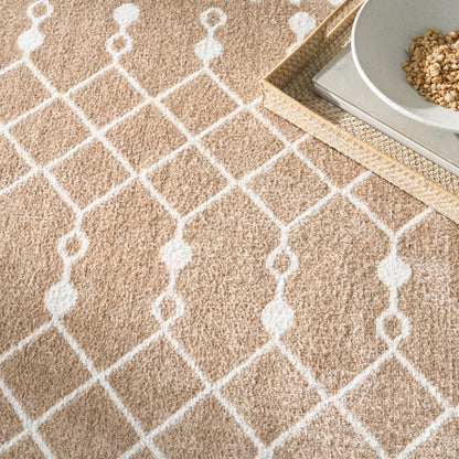 Beige textured rug with white lattice pattern.