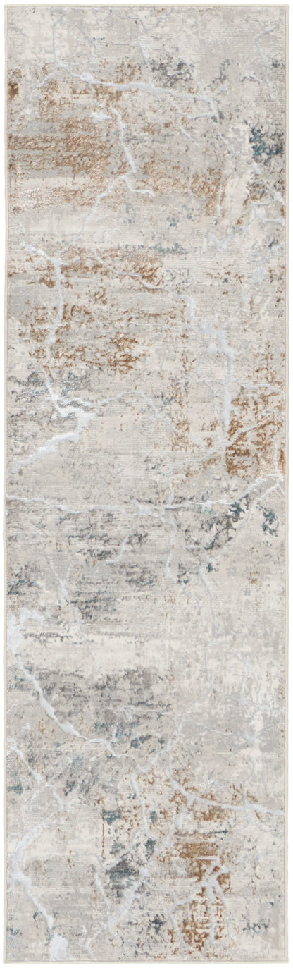 Long rectangular runner rug with a distressed abstract beige, ivory and gray pattern and weathered brown accents.