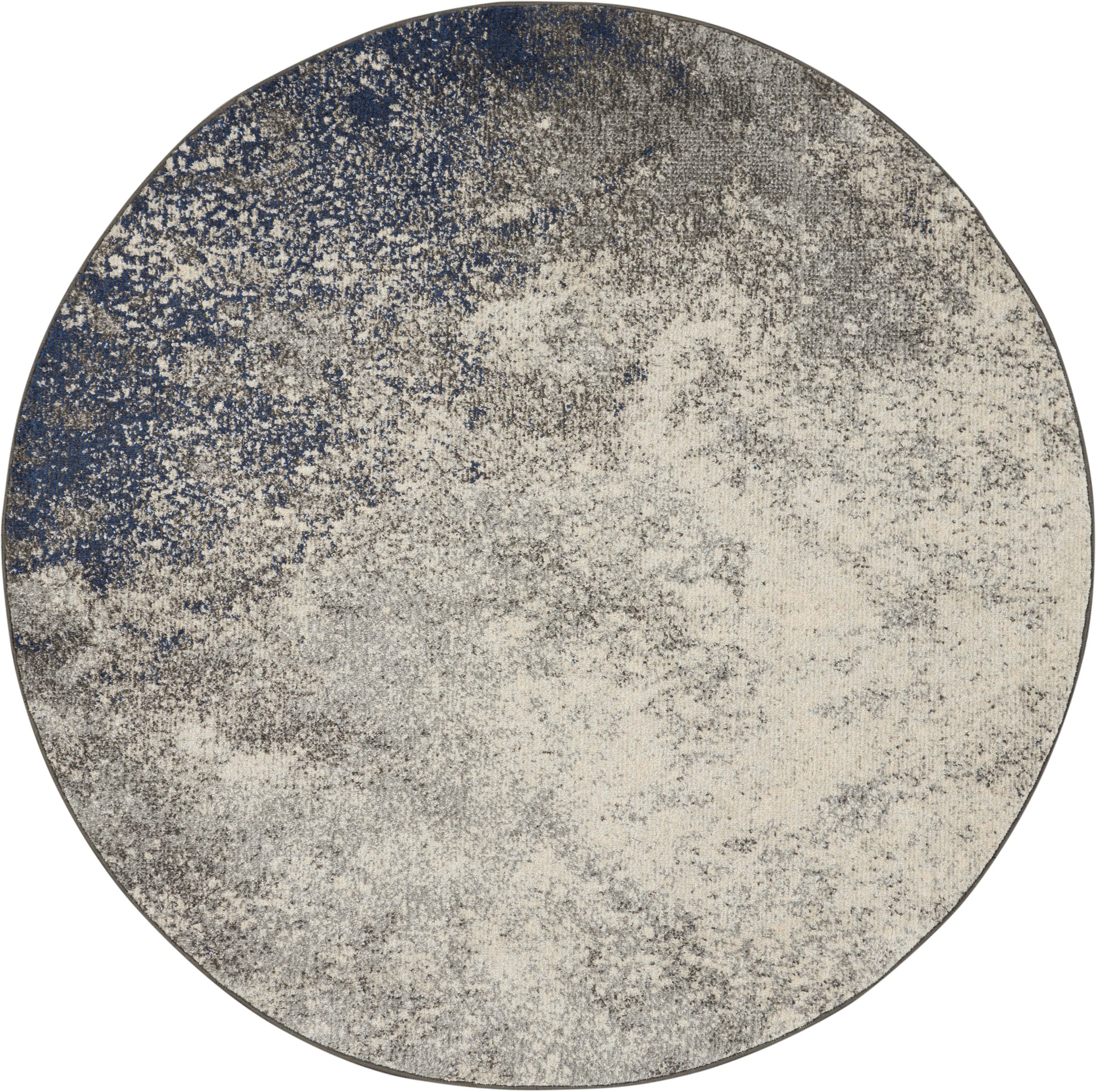 Round area rug with cloudy blue & ivory speckled pattern; modern abstract design, soft texture, ideal for living rooms.