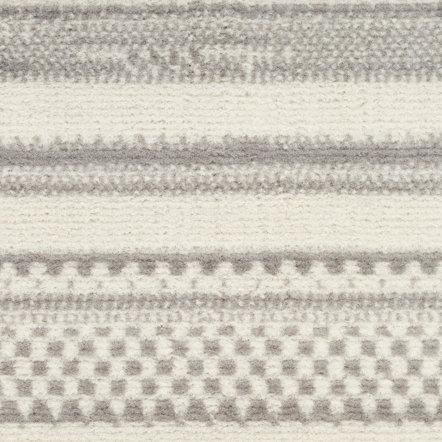 Gray and off-white striped rug with checkerboard motif, 2' x 4', modern home decor.