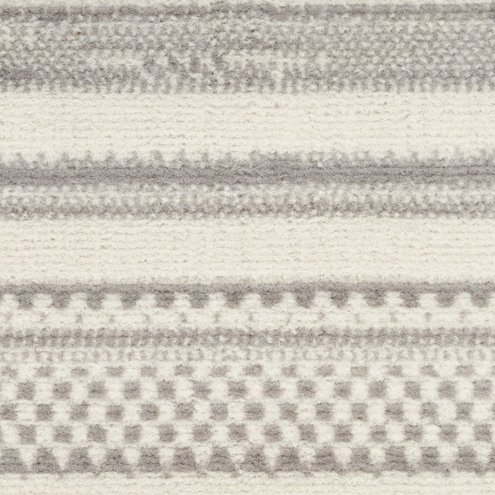 Gray and off-white striped rug with checkerboard motif, 2' x 4', modern home decor.