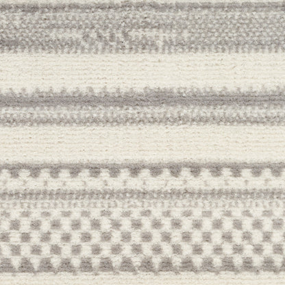 Gray and off-white striped rug with checkerboard motif, 2' x 4', modern home decor.